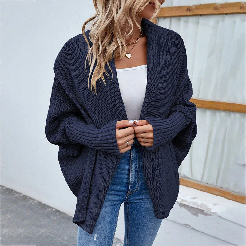 Cozy knit cardigan jacket in various colors with relaxed bat-wing sleeves and large lapel design for women's fall and winter fashion