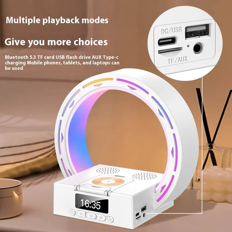 White multifunctional Bluetooth speaker with wireless charging pad, bedside lamp and digital clock display on wooden table