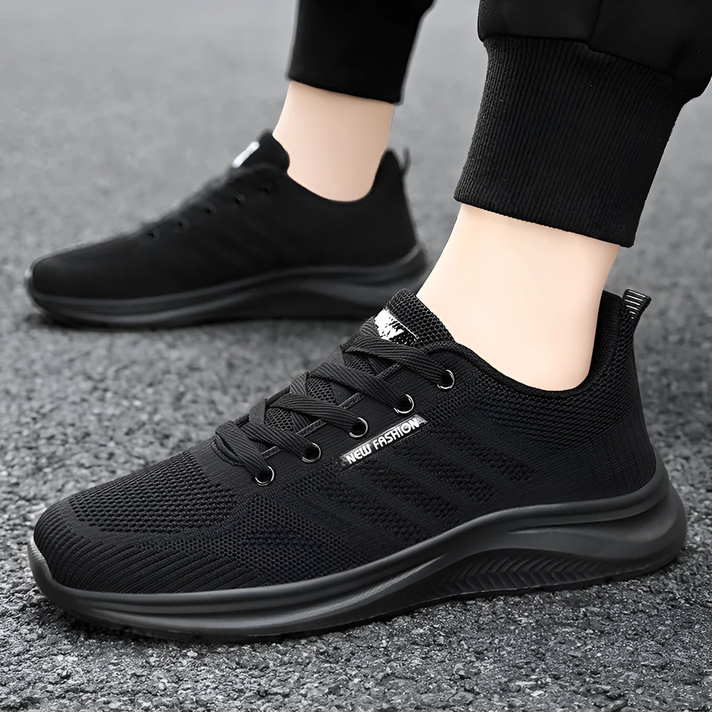 Unisex black mesh trainers in solid colour, sizes 36-44, casual shoes for men and women
