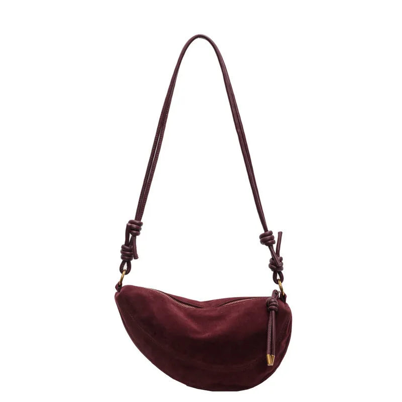 Soft PU leather crossbody underarm dumpling bag in black with sewing line detail and sandwich pocket