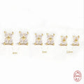 S925 sterling silver stud earrings with a geometric flower and crystal design in gold or platinum finish.