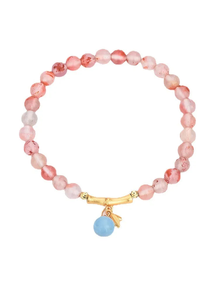 Ice Float Nanhong Agate Bracelet with flower shape and bamboo joint design.