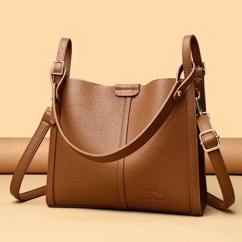 Brown PU women's shoulder bag with single strap and multiple interior compartments