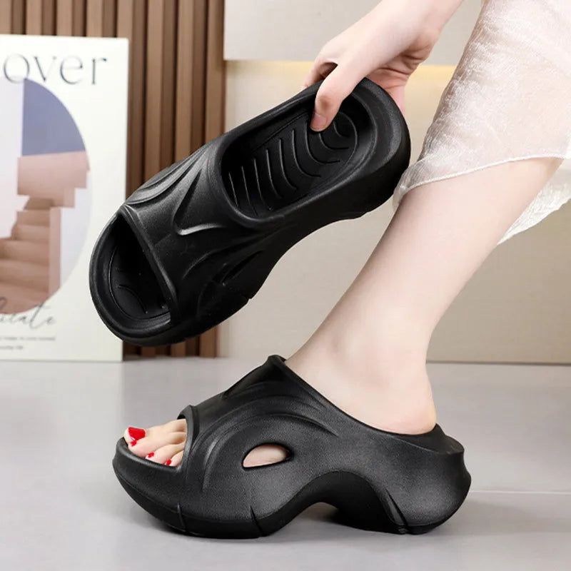 Women's thick-soled EVA beach slippers in white, black, and rose red colours with round toe design