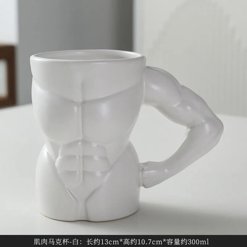 Matte black ceramic mug with muscle design and 300ml capacity