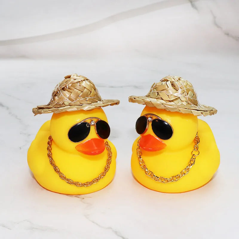 Yellow cartoon duck wearing straw hat car dashboard decoration with adhesive gel and sunglasses accessory