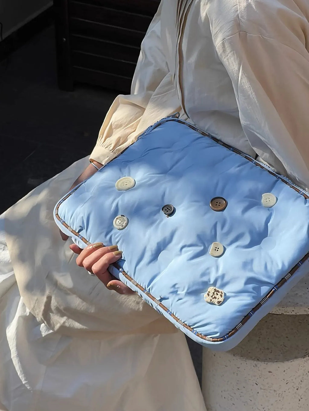 Blue plaid pattern nylon laptop sleeve case for a 14-inch computer, shown with a size tag.