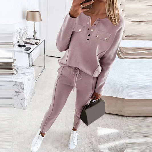 Cozy autumn two-piece loungewear set with crew-neck sweatshirt and high-waisted pants in solid colors