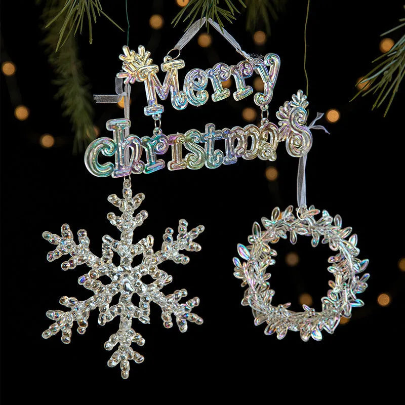 Colourful transparent acrylic Christmas hanging decorations in assorted festive shapes for tree and window displays