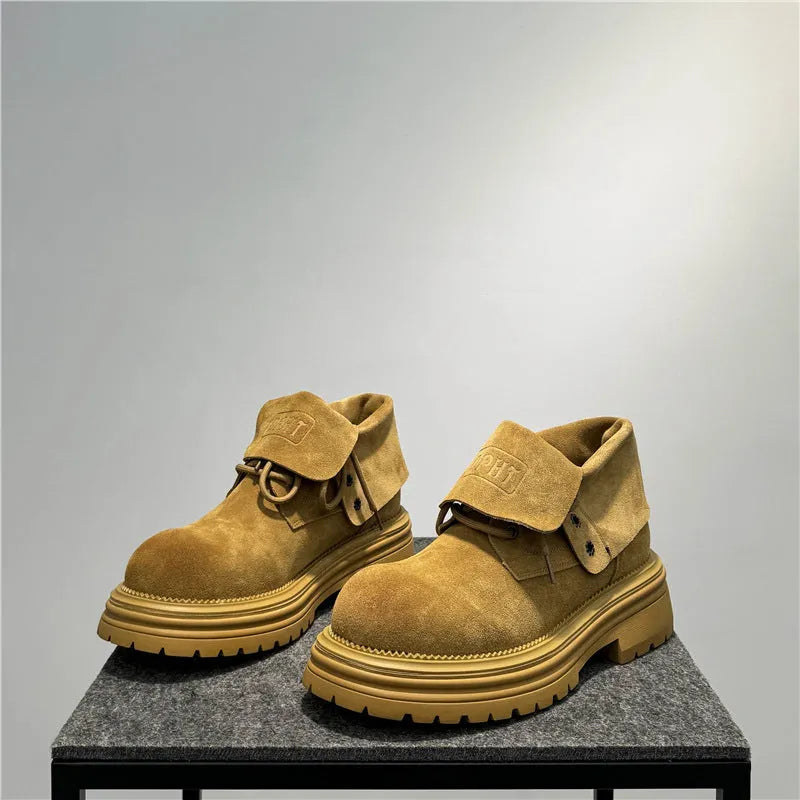 Retro distressed thick-soled suede boots with buckle closure in camel colour.
