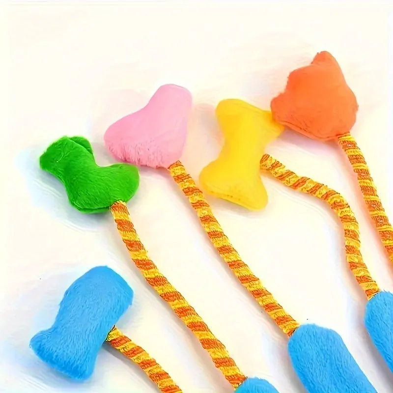 Yellow and blue plush magic glove toy for cats with a bell, shown next to a tape measure indicating its 40 cm length.