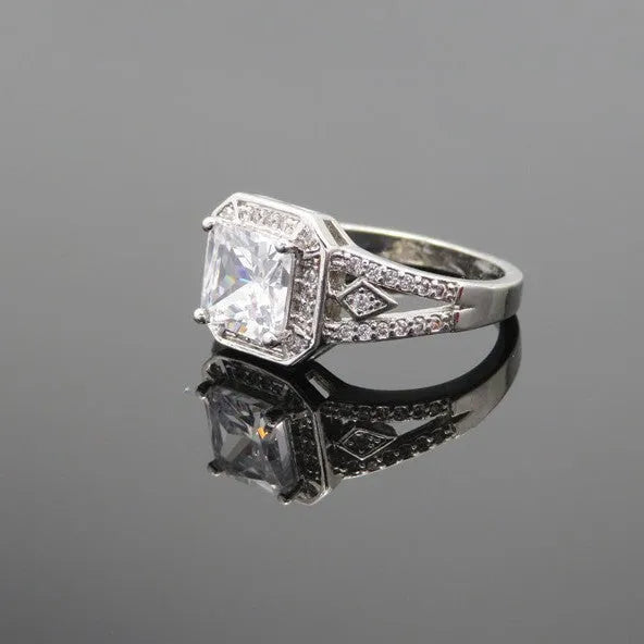 Geometric hollow zircon ring in platinum colour with quadrilateral design on copper band