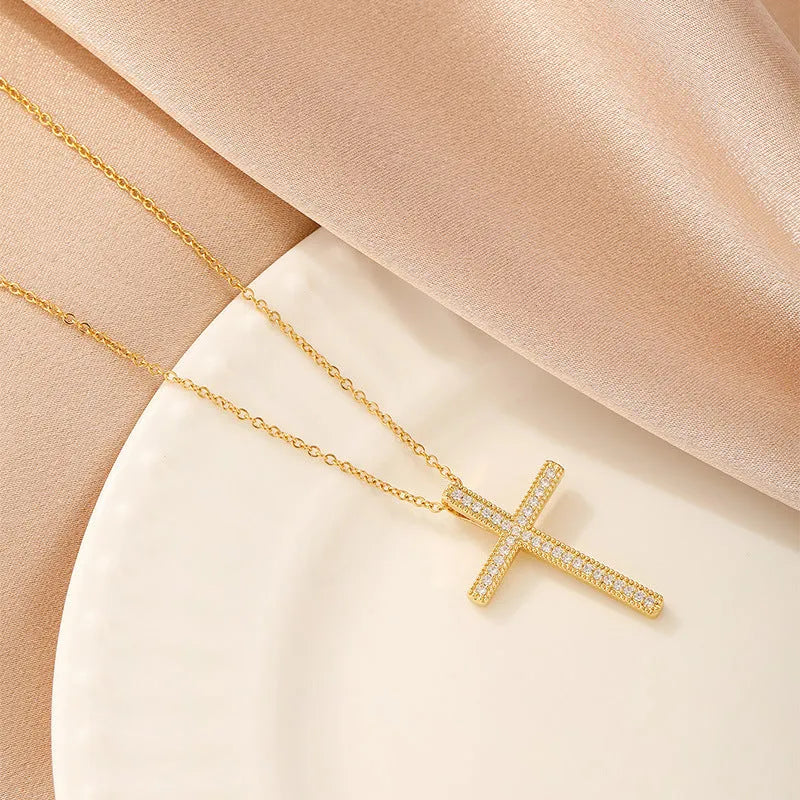 Women's copper electroplated necklace showing the butterfly, cross, heart, and round diamond pendant options.