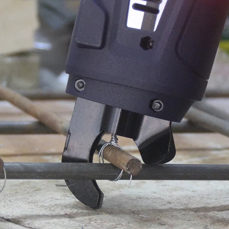 Fully automatic electric steel bar tying machine for rebar, with battery and toolbox.