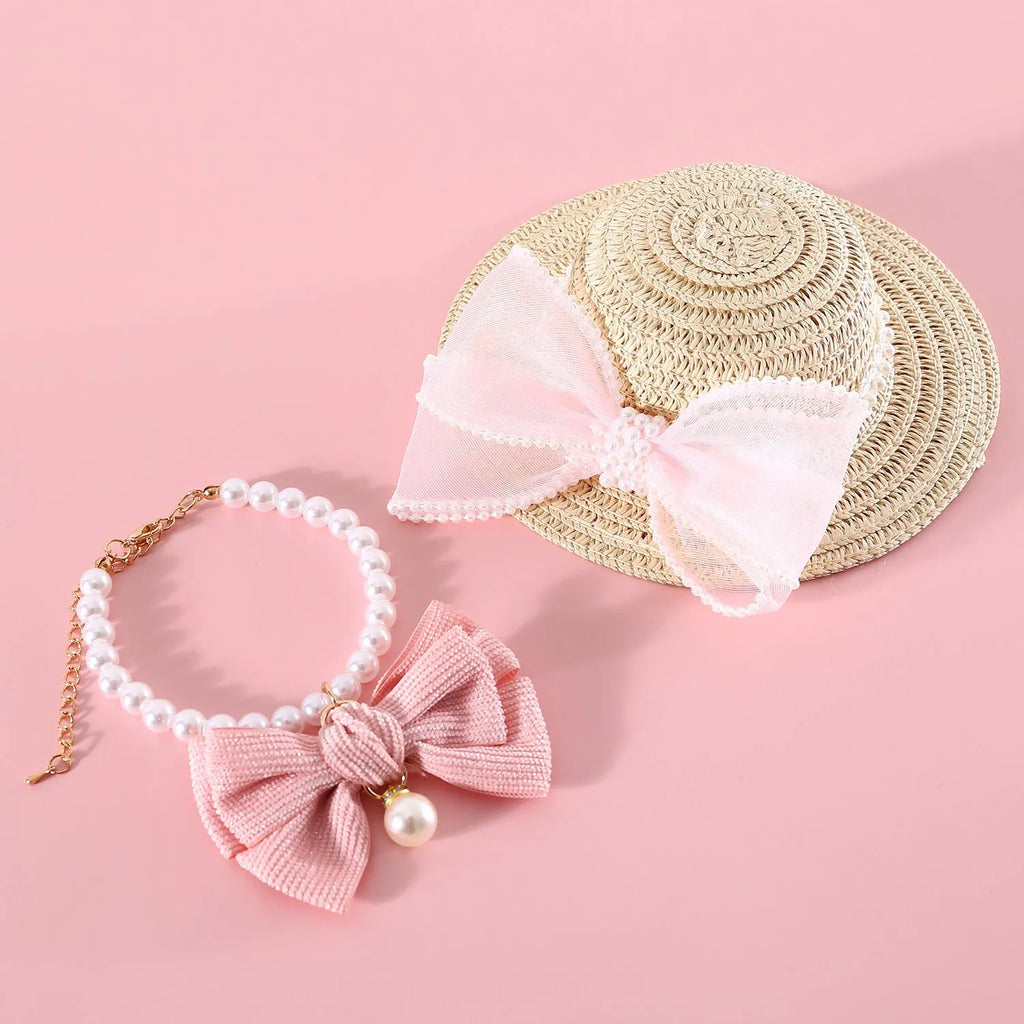 Woven Lafite leaf cat hat with pearl butterfly bow decoration in pink, purple, blue or white colours