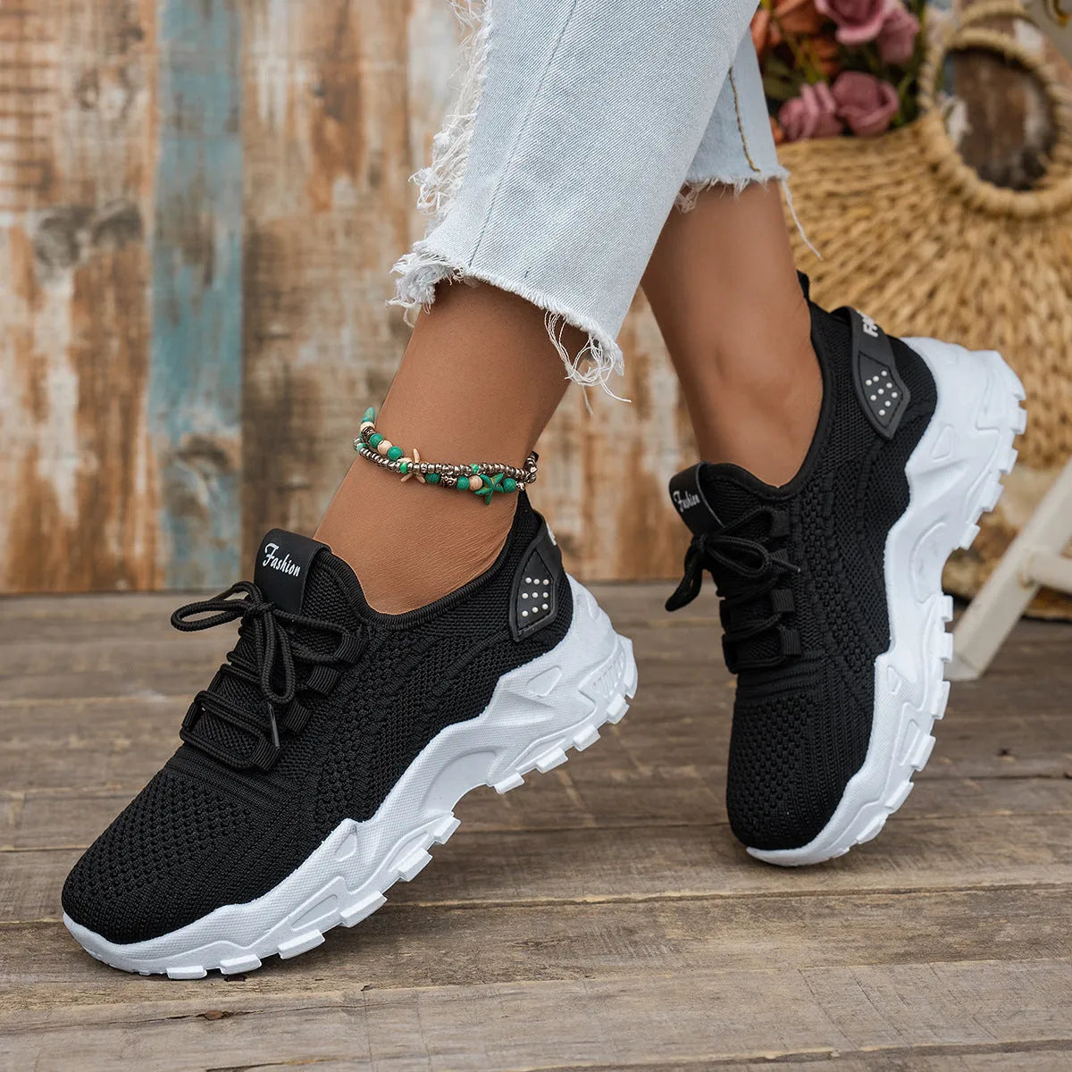 Women's Flyknit mesh casual sports shoes in multiple colours, showing lace-up design and flat sole.