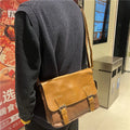 Retro men's messenger bag in light brown PU material with shoulder strap on neutral background