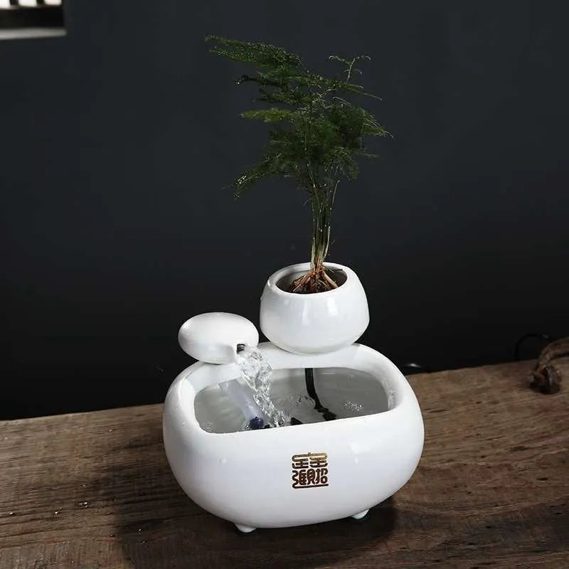 Creative ceramic desktop flowing water fountain ornament with atomizing humidifier in milky white finish