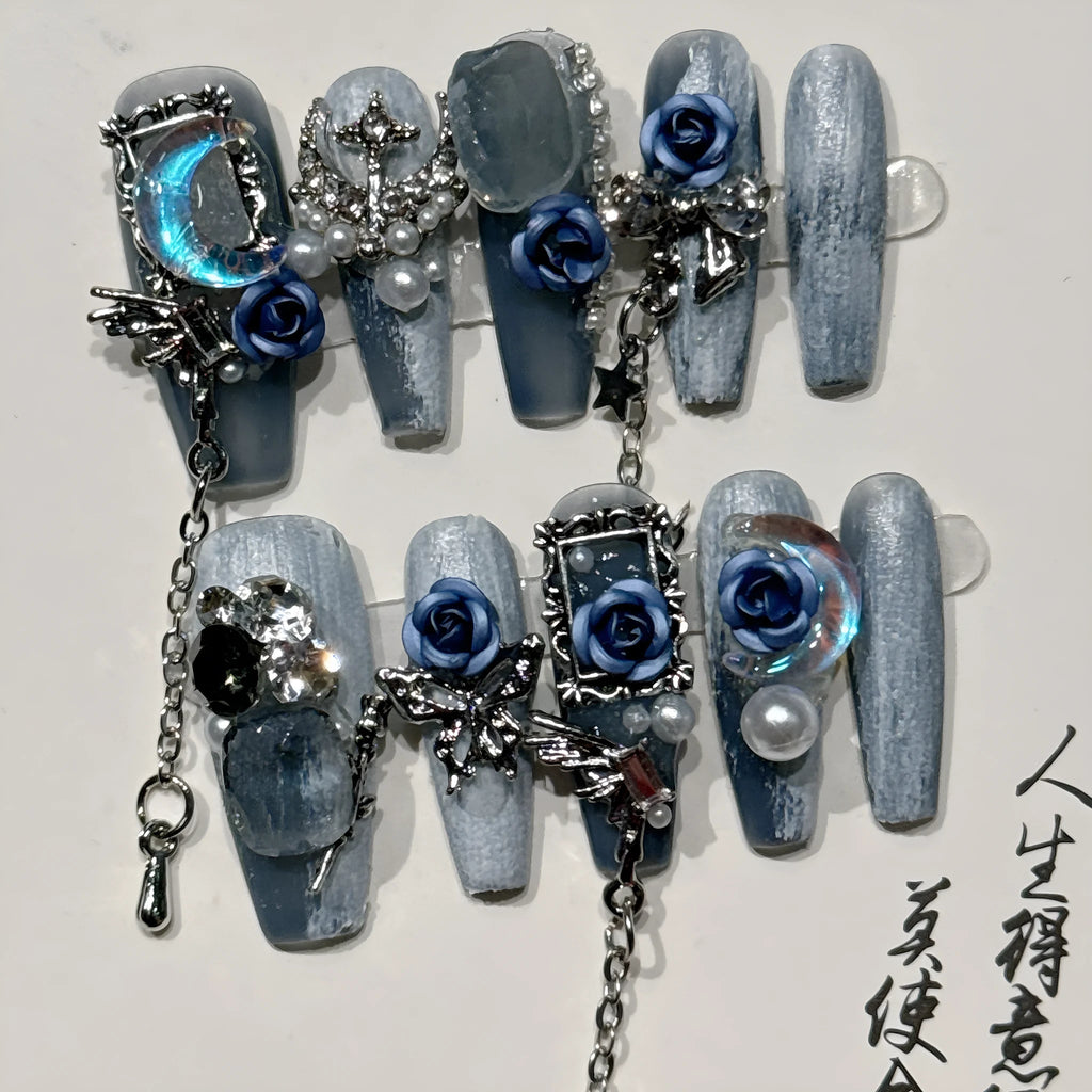 Evening manicure set with rose and tulip patterns in night blue colour featuring plastic armour suit
