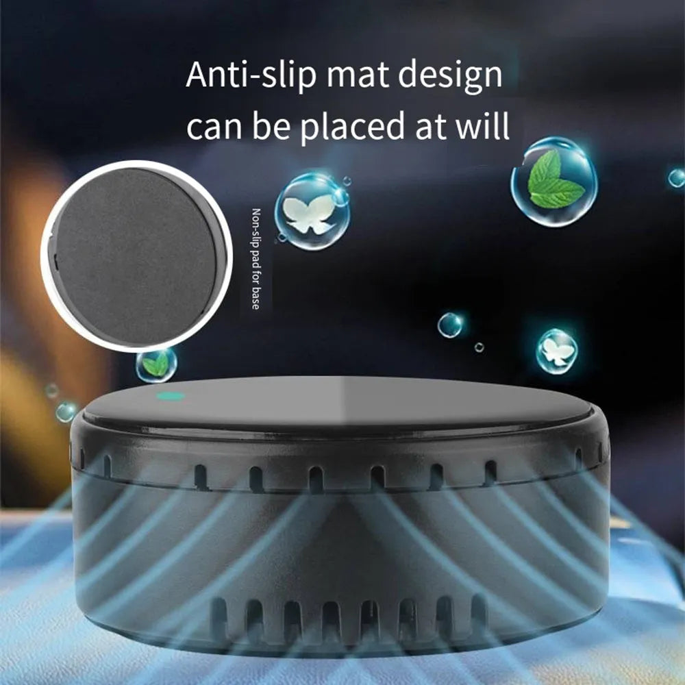 Black solar car humidifier mounted on vehicle air conditioning outlet with moisture mist visible
