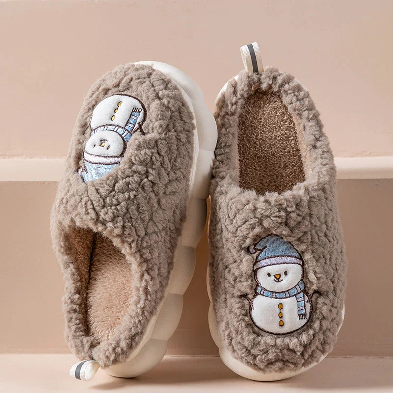 Cozy snowman-designed slippers with plush upper and anti-slip sole for indoor winter wear