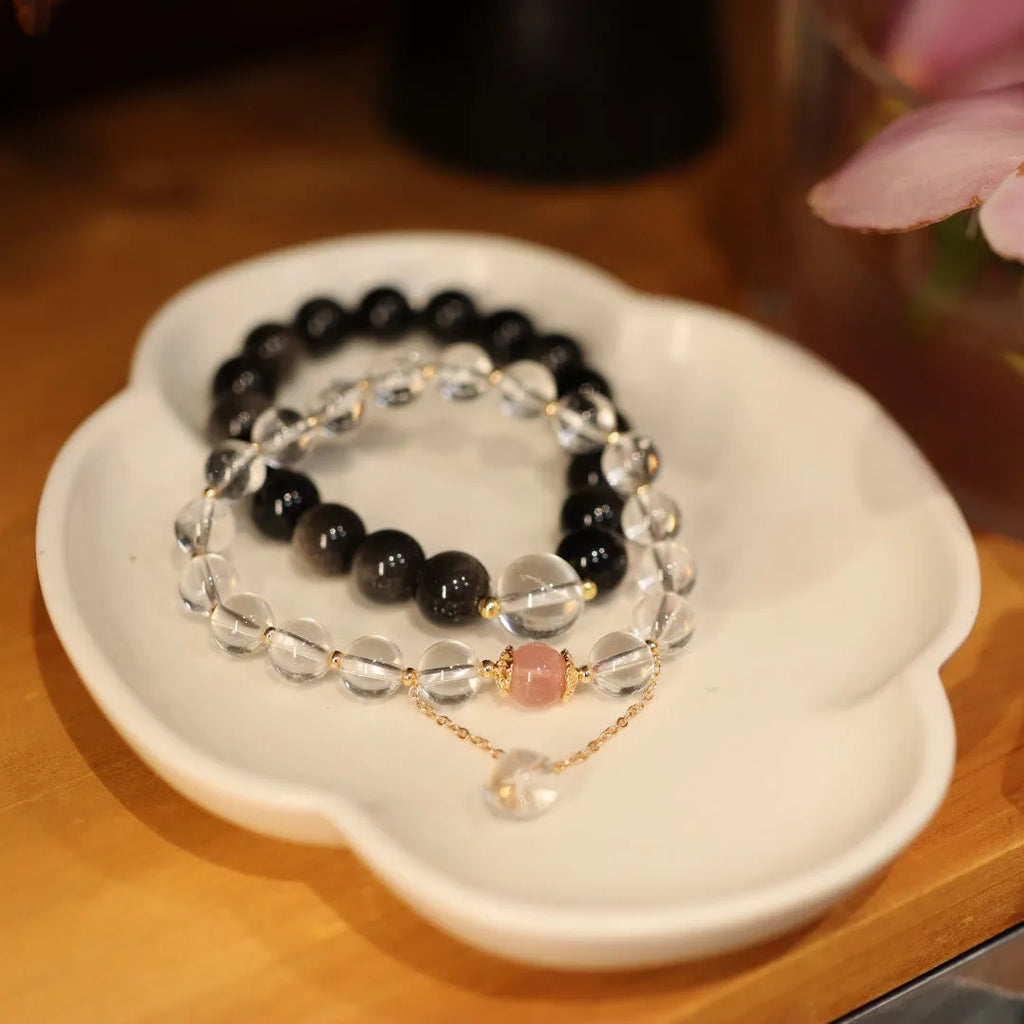White crystal bracelet with cat eye obsidian stone in geometric Chinese design