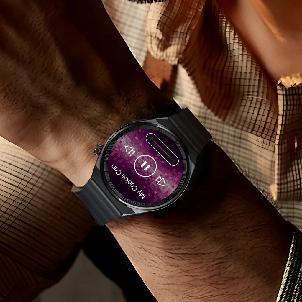 Smartwatch with round black casing and black steel strap on a wrist, showing home screen on its 1.39 inch display.