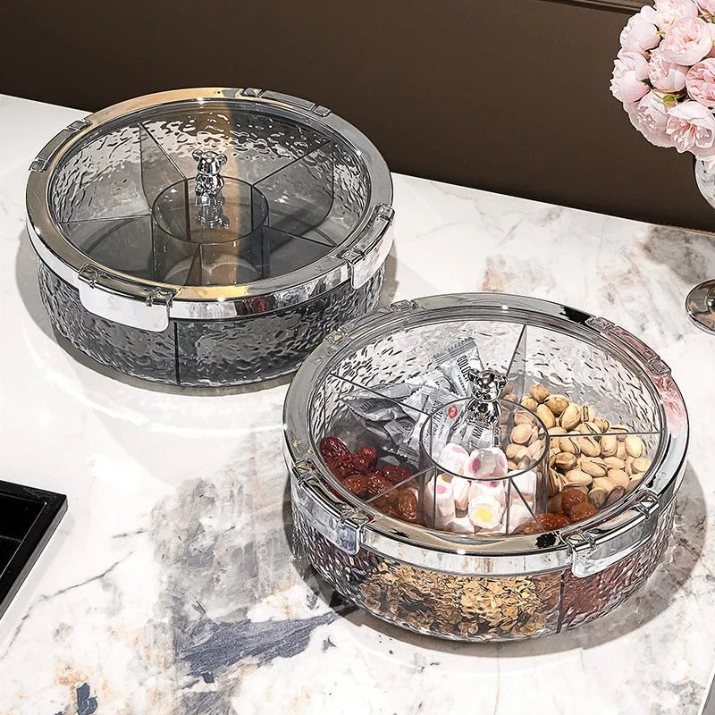 Sealed plastic candy box with lid in milk silver, transparent silver or transparent grey silver, holding dried fruit or sweets.