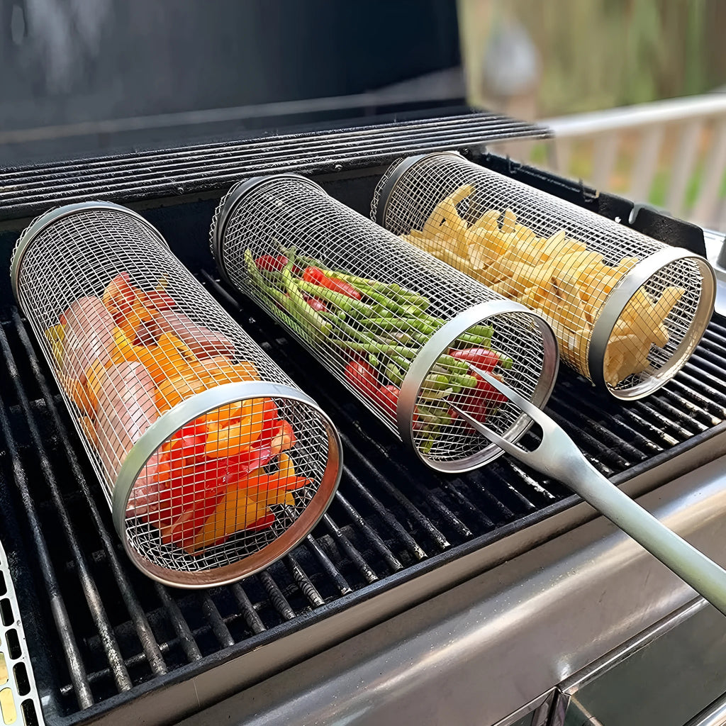 Round rolling metal barbecue grill basket with mesh sides and a handling hook, shown with BBQ gloves.