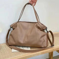 Large soft surface PU messenger tote bag with adjustable shoulder strap and zip opening