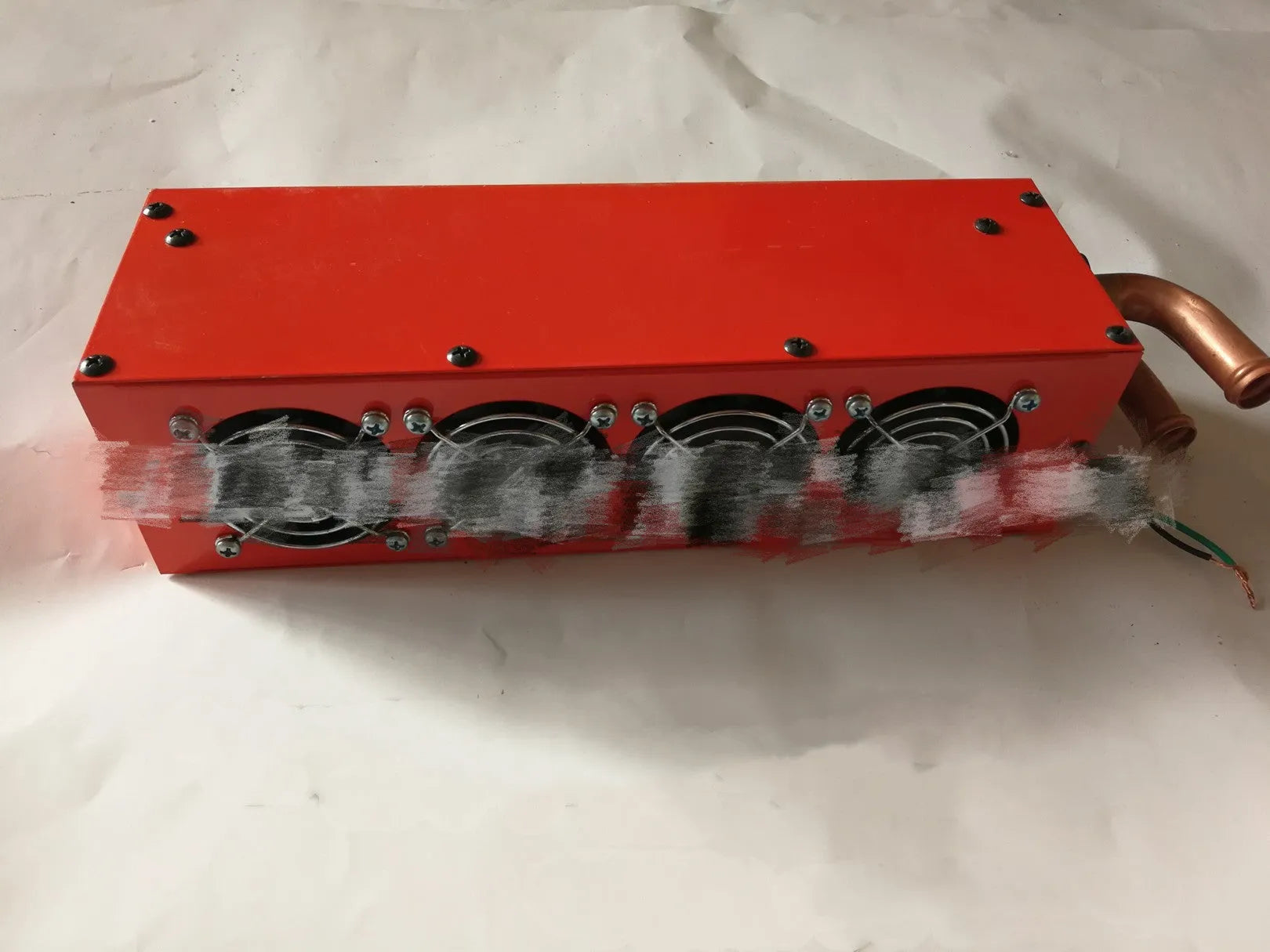 Compact metal car heater with four copper pipe connections for small vehicle engine waste heat system