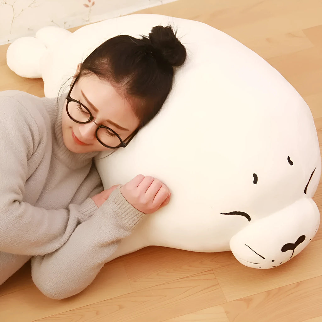 White sea lion plush toy with short plush fabric and PP cotton filling on display