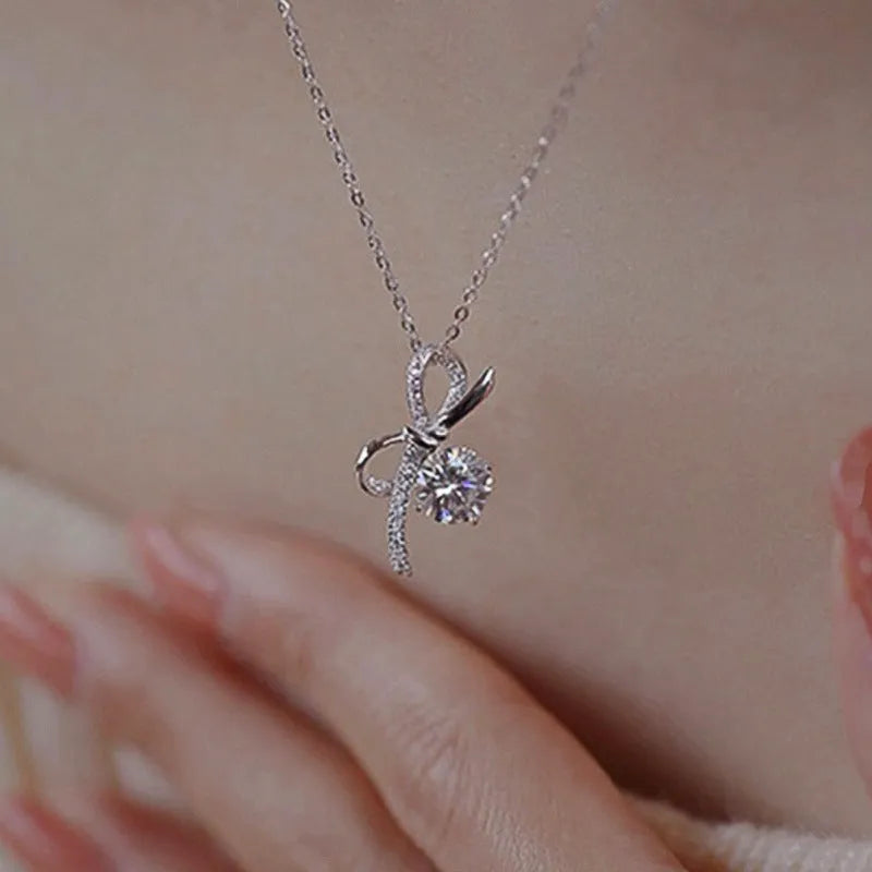 Bow necklace for women in XL1511 White Gold with inlaid zircon, copper base, and O-ring chain, 21-50cm.