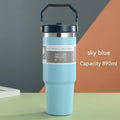 30oz insulated stainless steel travel tumbler with handle, shown in dark pink with a black sliding lid.