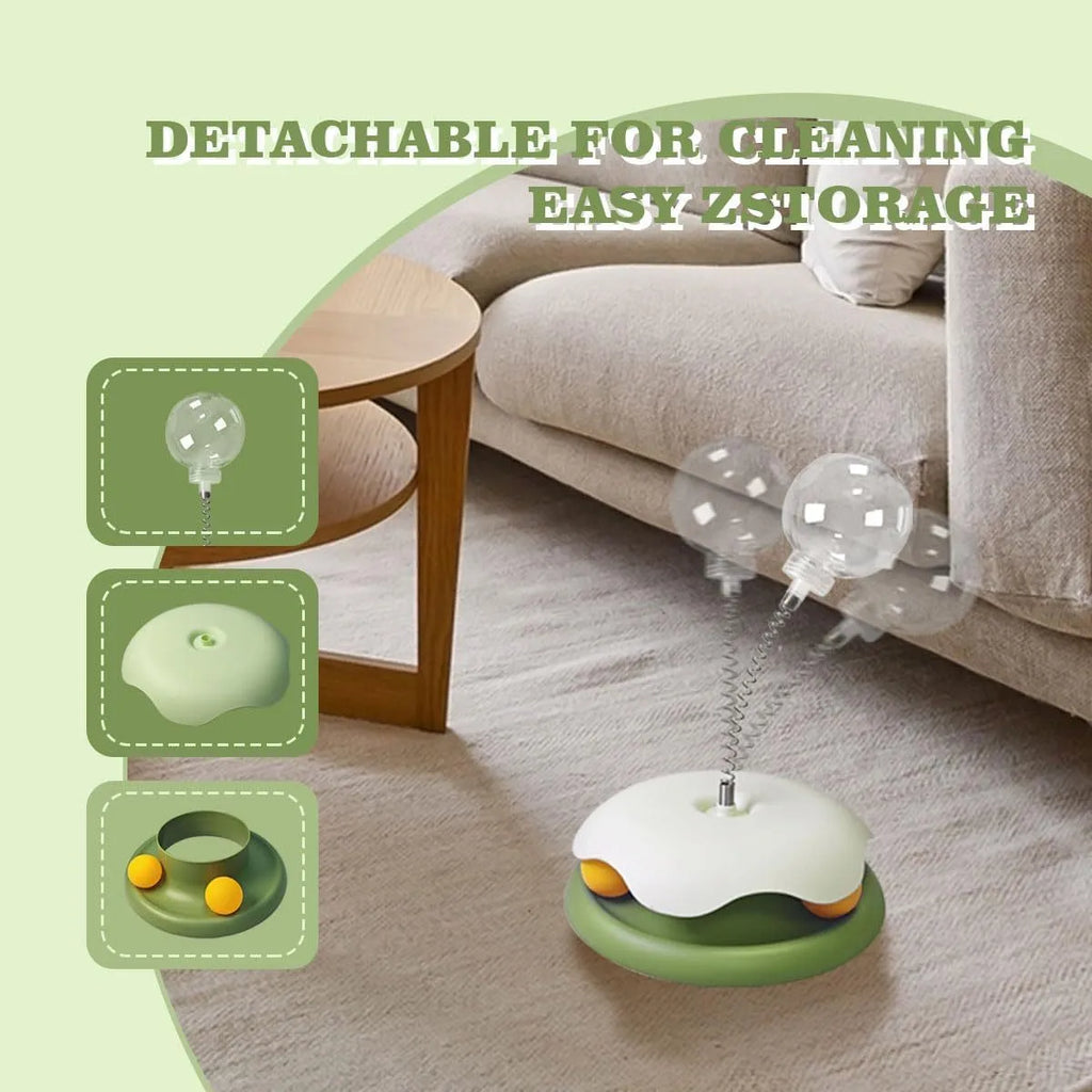 Blue and green cat treat dispenser toy with track ball for slow feeding and play