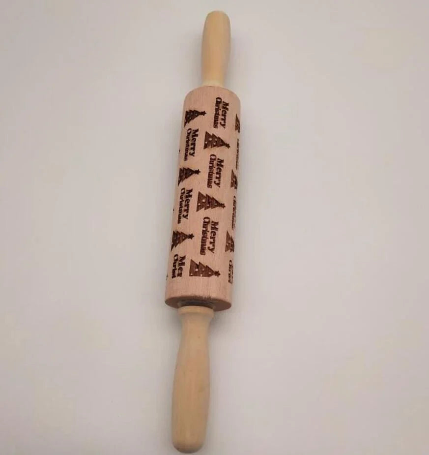 Personalized Christmas rolling pin with a variety of embossed holiday designs, including snowflakes, reindeer, and Merry Christmas patterns