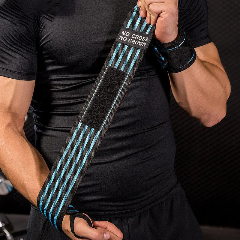 Weightlifting strength wristband in blue nylon with adjustable strap on gym floor