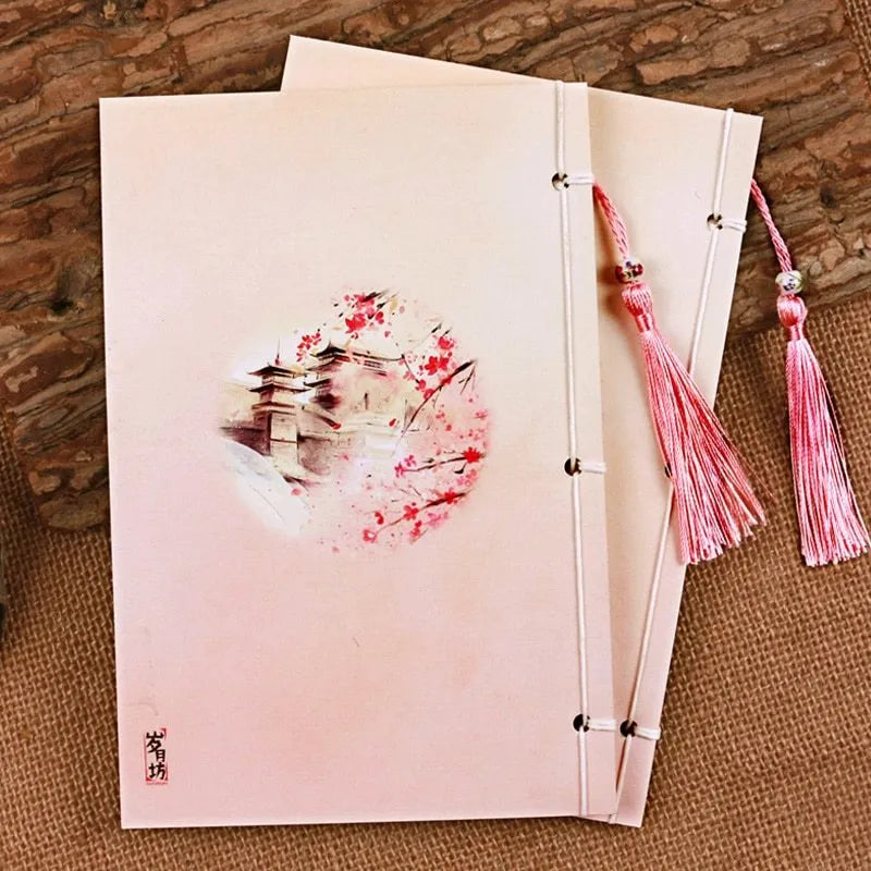Azalea-coloured Chinese style notebook with thread binding showing watercolour retro cover