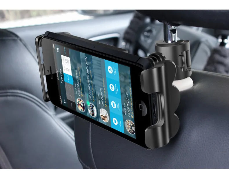 Black universal car headrest holder mounting a tablet for rear seat passenger use
