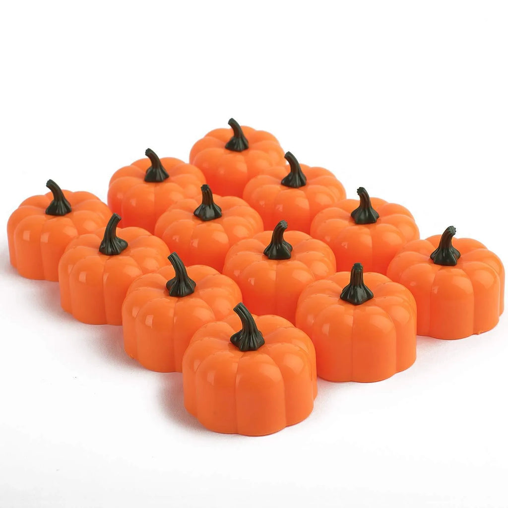 Yellow LED pumpkin light decoration 4.9x4.3 cm on a tabletop for Halloween Christmas party