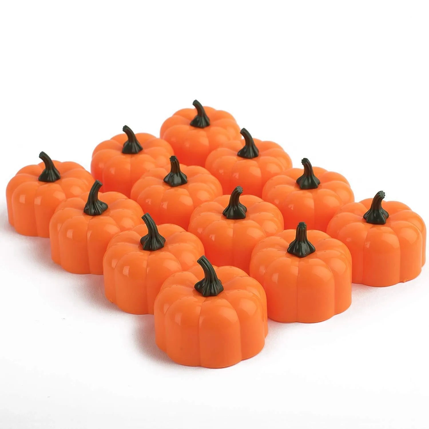Yellow LED pumpkin light decoration 4.9x4.3 cm on a tabletop for Halloween Christmas party