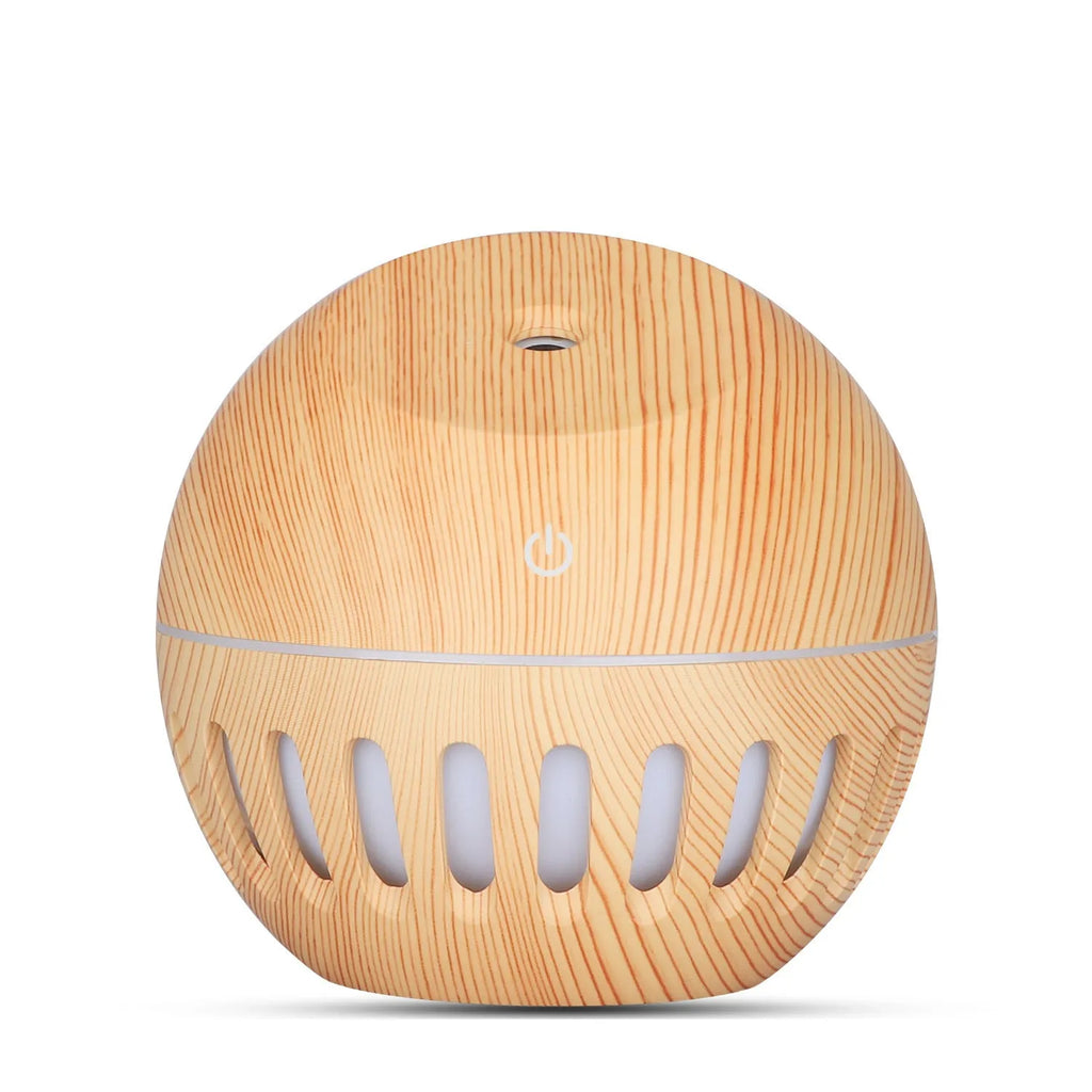 Planet portable USB humidifier in dark wood finish with single fog outlet