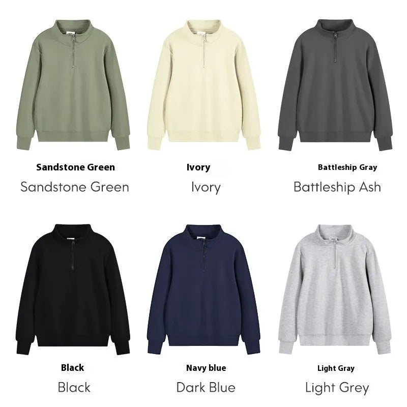 Man wearing a grey zip-front stand collar cotton sports sweater with a straight cut for casual wear.