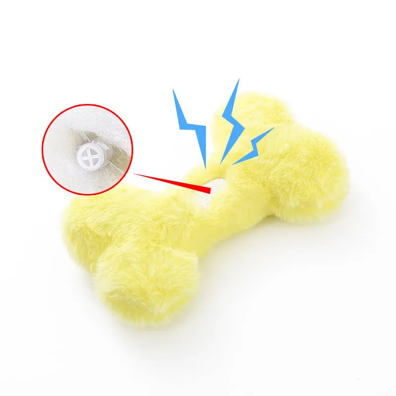 Blue bone-shaped plush dog toy with squeaker and grinding teeth texture for interactive play