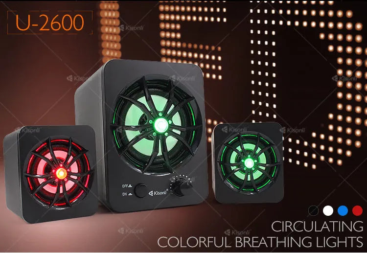 Green USB computer speaker with colourful glowing lights showing USB and 3.5mm ports
