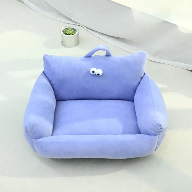 Cartoon big eyes pet bed cushion in blue colour, measuring approximately 60cm by 45cm