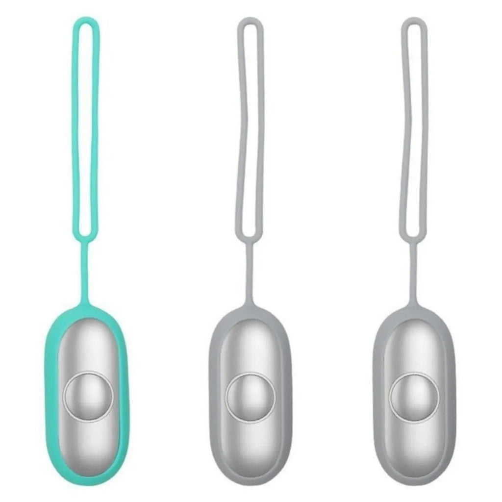 Handheld micro-current sleep aid device in grey, green, or orange colour with USB charging cable.
