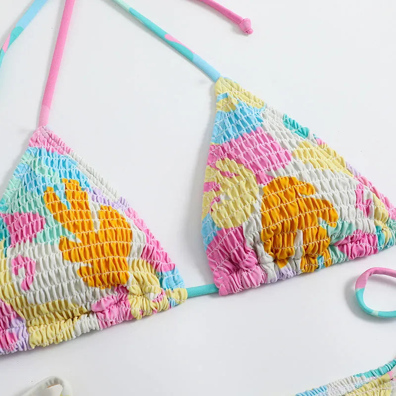 Women's triangle bag bikini with printed floral gradient pattern and smocking craft detailing