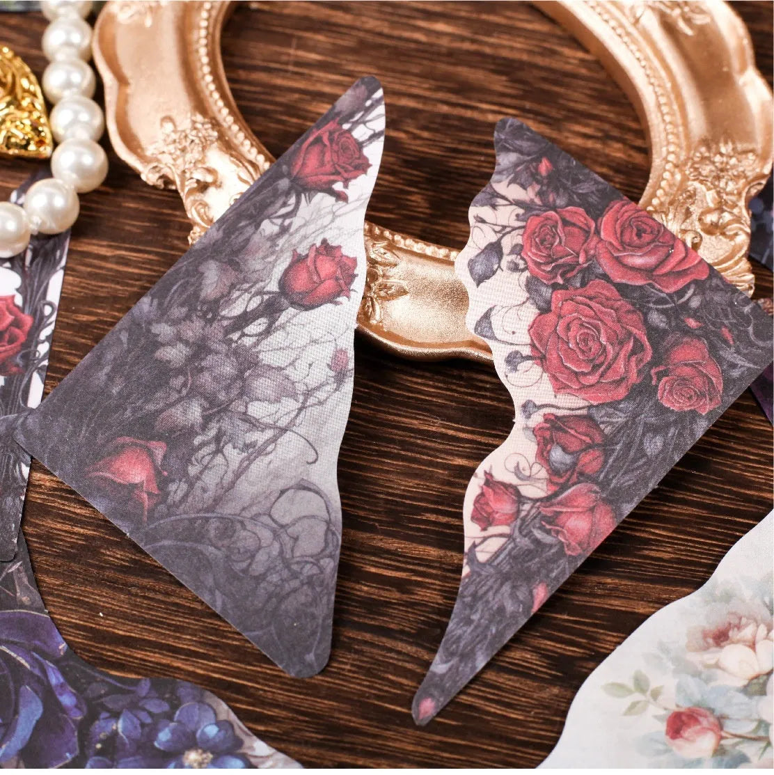 Set of printed paper bookmarks and notes in six different colours including blue, green, pink, purple, and red designs