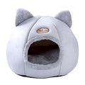 Semi-enclosed warm and fluffy pet nest in plush fabric with raised rim, available in M L and XL sizes for dogs and cats